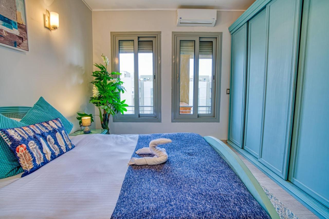 The Suites Near Auc By Elegant Caïro Buitenkant foto