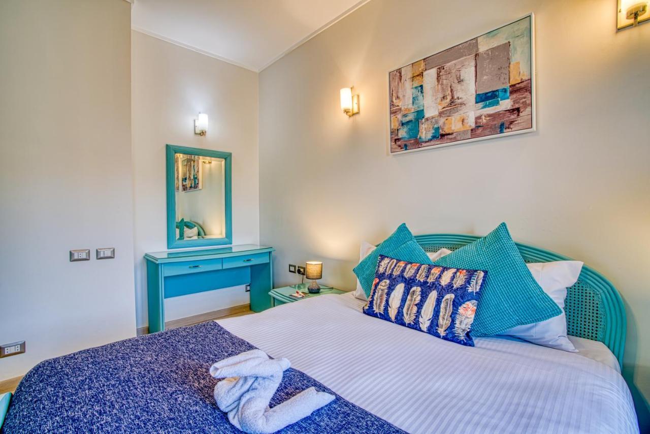The Suites Near Auc By Elegant Caïro Buitenkant foto