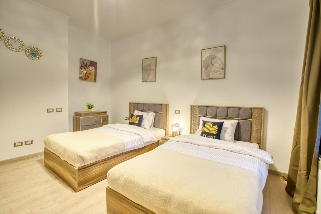 The Suites Near Auc By Elegant Caïro Buitenkant foto