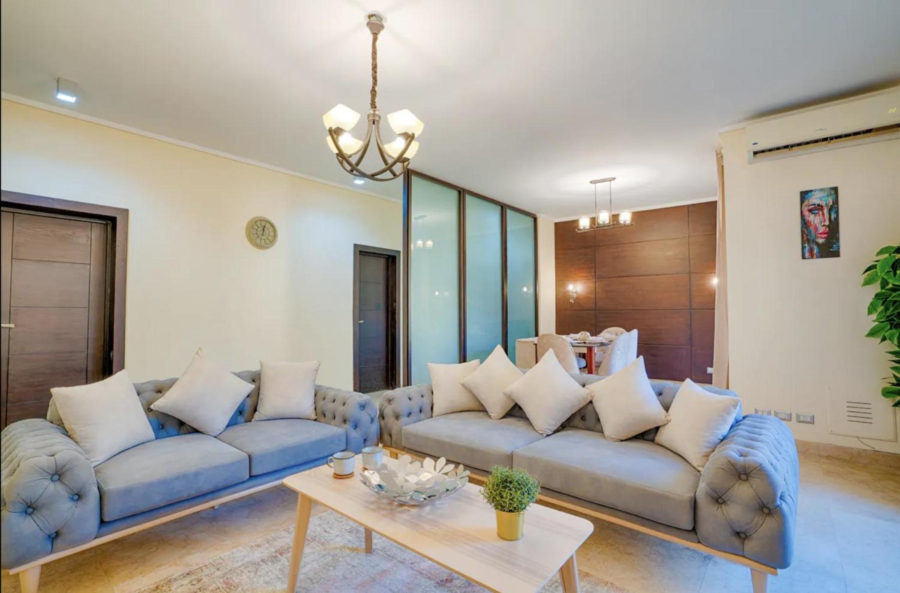 The Suites Near Auc By Elegant Caïro Buitenkant foto